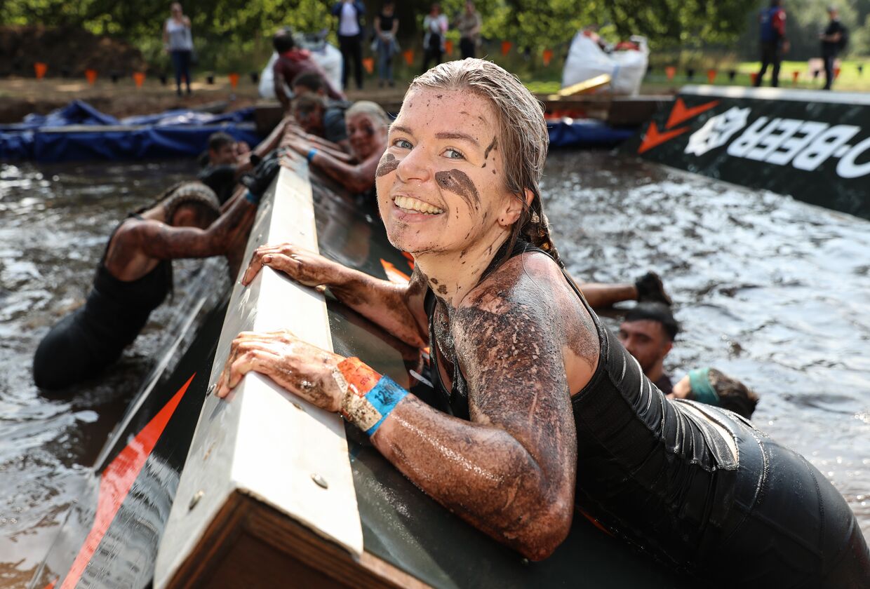 Participant smiles as she landed on one of the block of The Blockness Monster