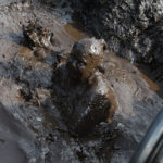 man in mud