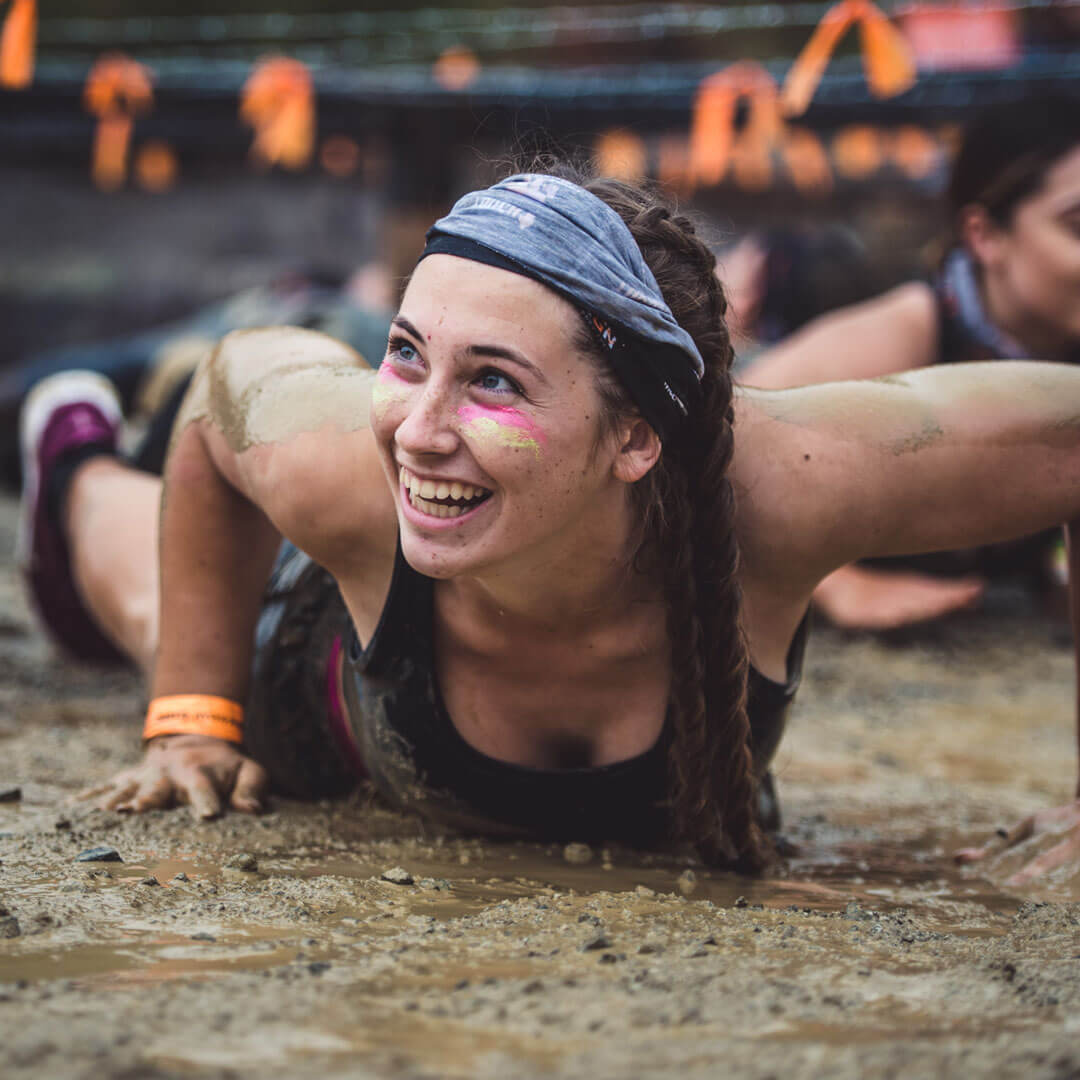 Participant smiling while crawling